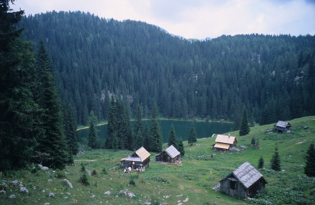 Huts on a Lake in the Julien Alps